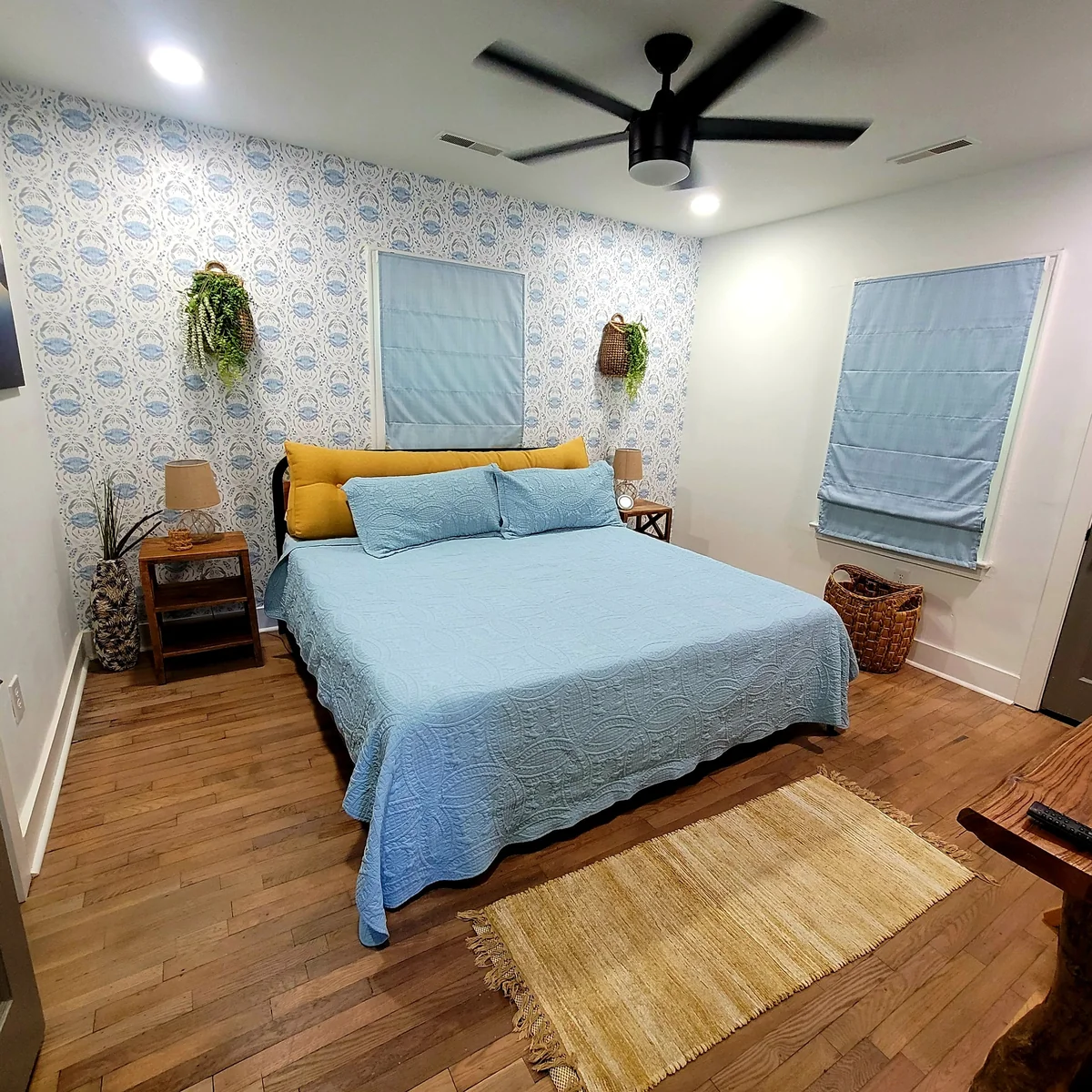 Blue coastal bedroom ready for guests